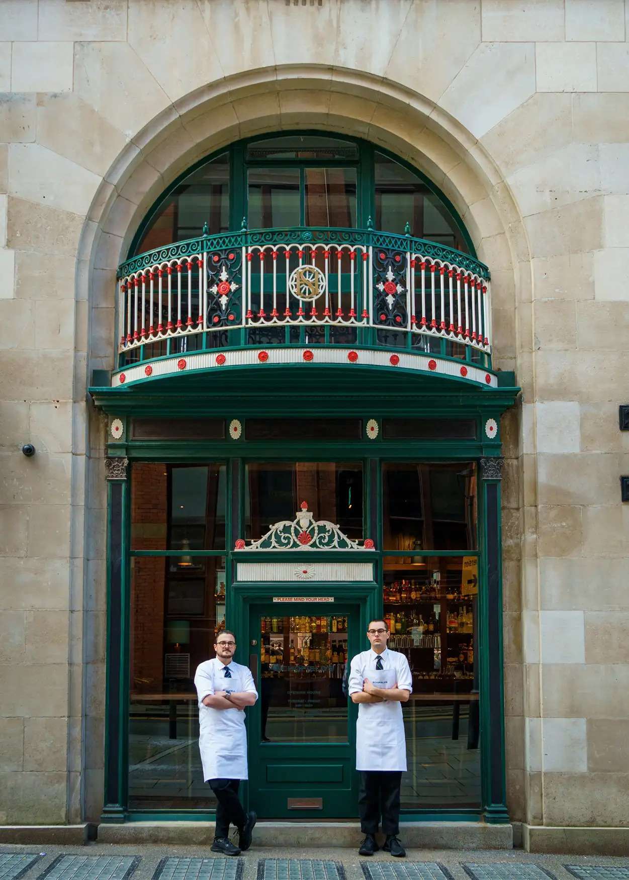 The Schofield Brothers outside SCHOFIELD'S BAR Manchester