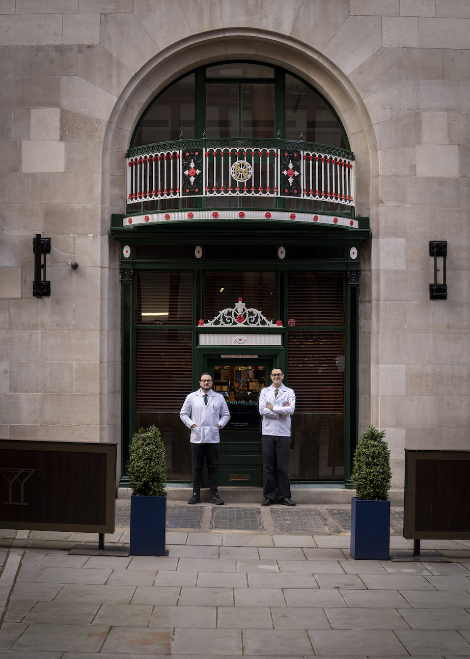 The Schofield Brothers outside SCHOFIELD'S BAR Manchester